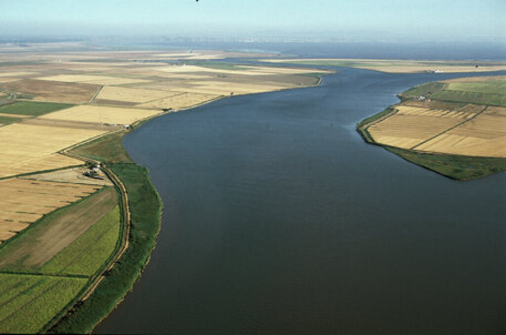 Aerial view of a large river and floodplain system.